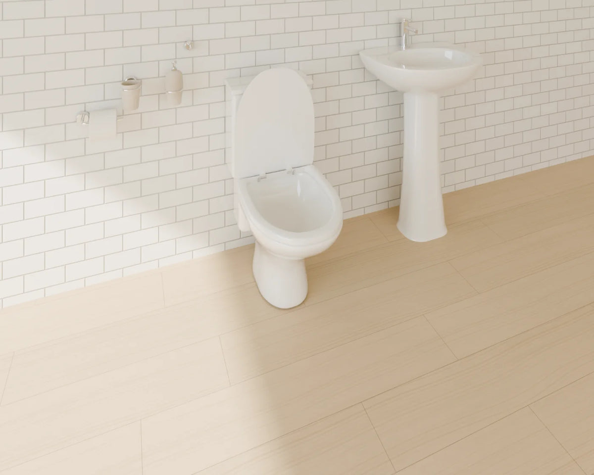 Close-Coupled Toilet styled in a Linden House room with the bathroom accessories set, pedestal basin and basin mixer tap (sold separately)