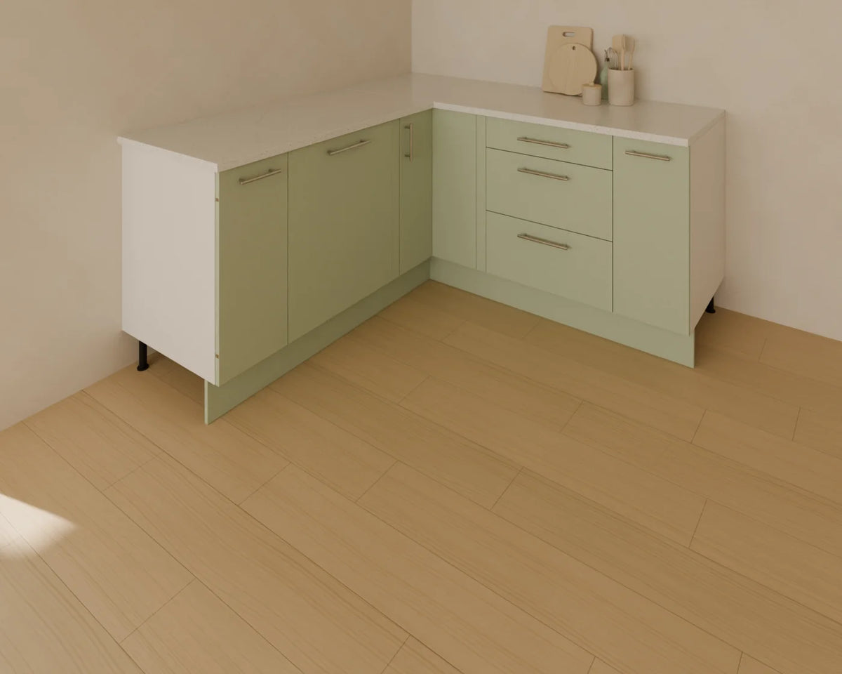 Corner Base Cabinet styled in a Linden House room with the base drawer cabinet, base door cabinet, worktop run and kitchen counter accessories (sold separately)