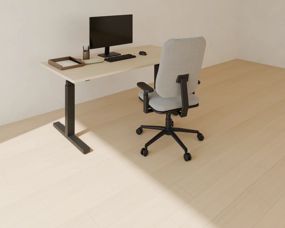 Ergonomic Office Chair styled in a Linden House room with the sit-stand desk, monitor and keyboard and desk accessories set (sold separately)