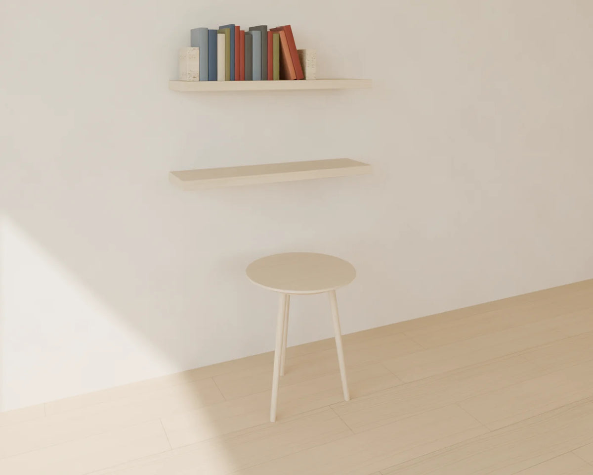 Floating Wall Shelf styled in a Linden House room with the book row and round side table (sold separately)