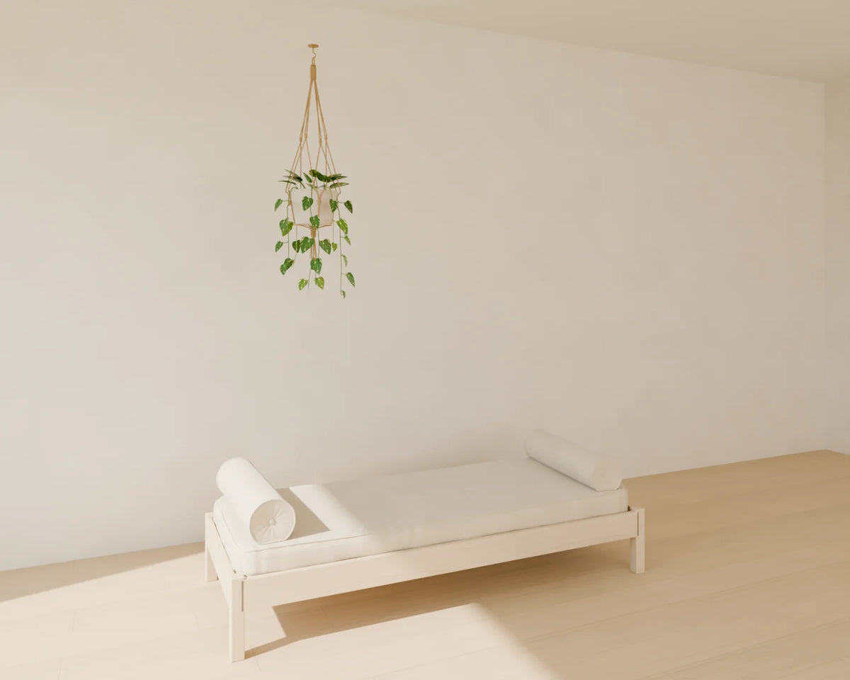 Hanging Macrame Planter styled in a Linden House room with the upholstered daybed (sold separately)