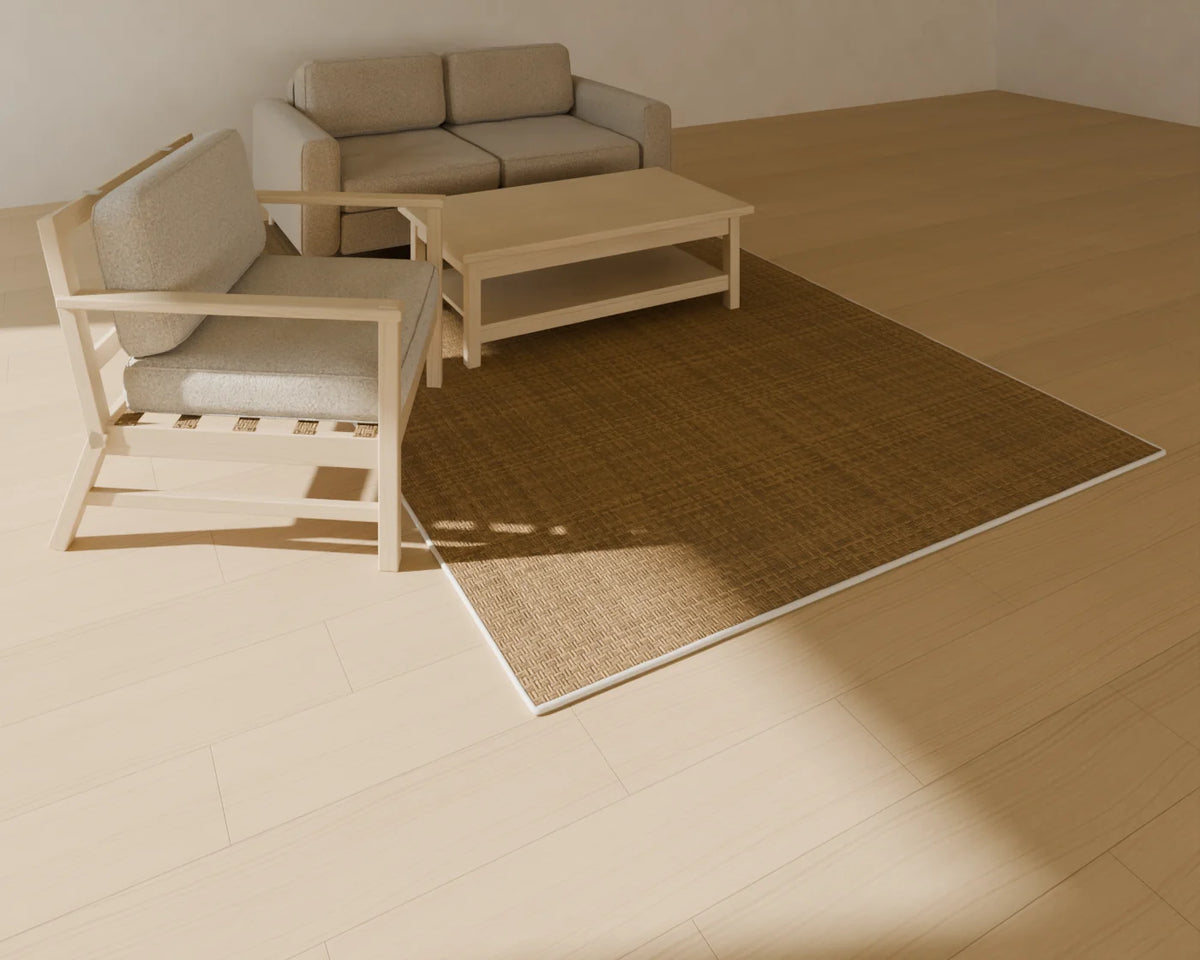 Jute Rug styled in a Linden House room with the two-seat sofa, rectangular coffee table and lounge armchair (sold separately)