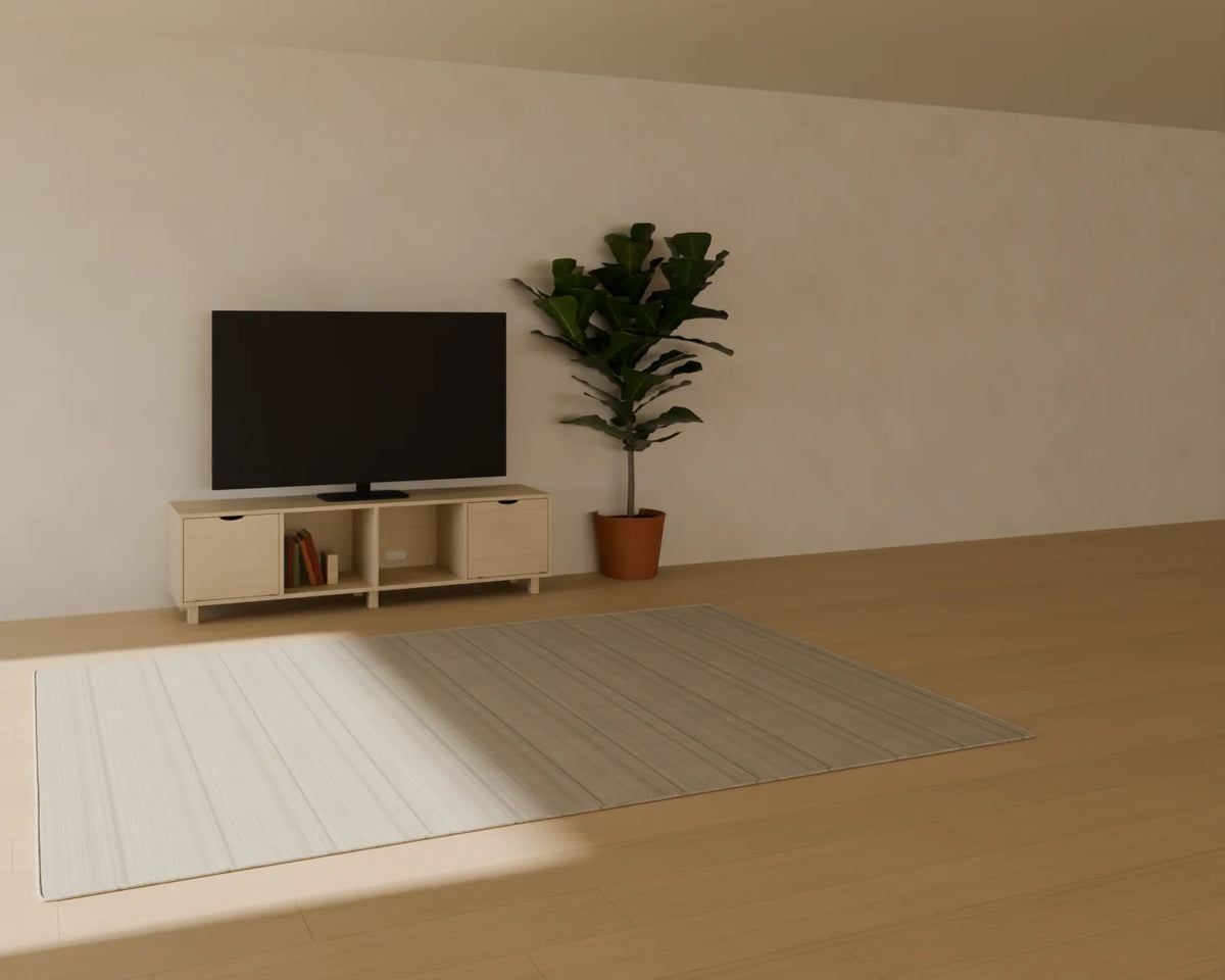 Low Media Unit styled in a Linden House room with the flat-screen tv, book row, fiddle-leaf fig in planter and flatweave wool rug (sold separately)