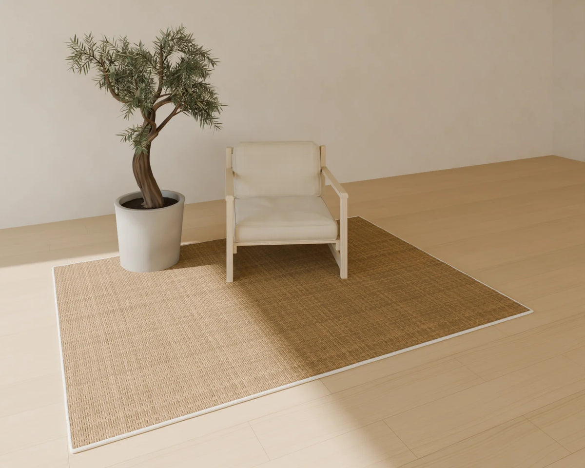 Olive Tree in Planter styled in a Linden House room with the low timber lounge chair and jute rug (sold separately)