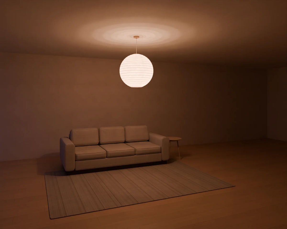 Paper Lantern Pendant styled in a Linden House room with the three-seat sofa, flatweave wool rug and round side table (sold separately)