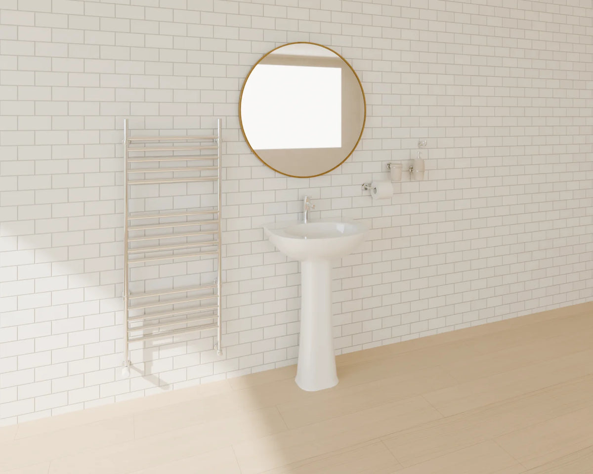 Pedestal Basin styled in a Linden House room with the basin mixer tap, bathroom accessories set, heated towel rail and round wall mirror (sold separately)