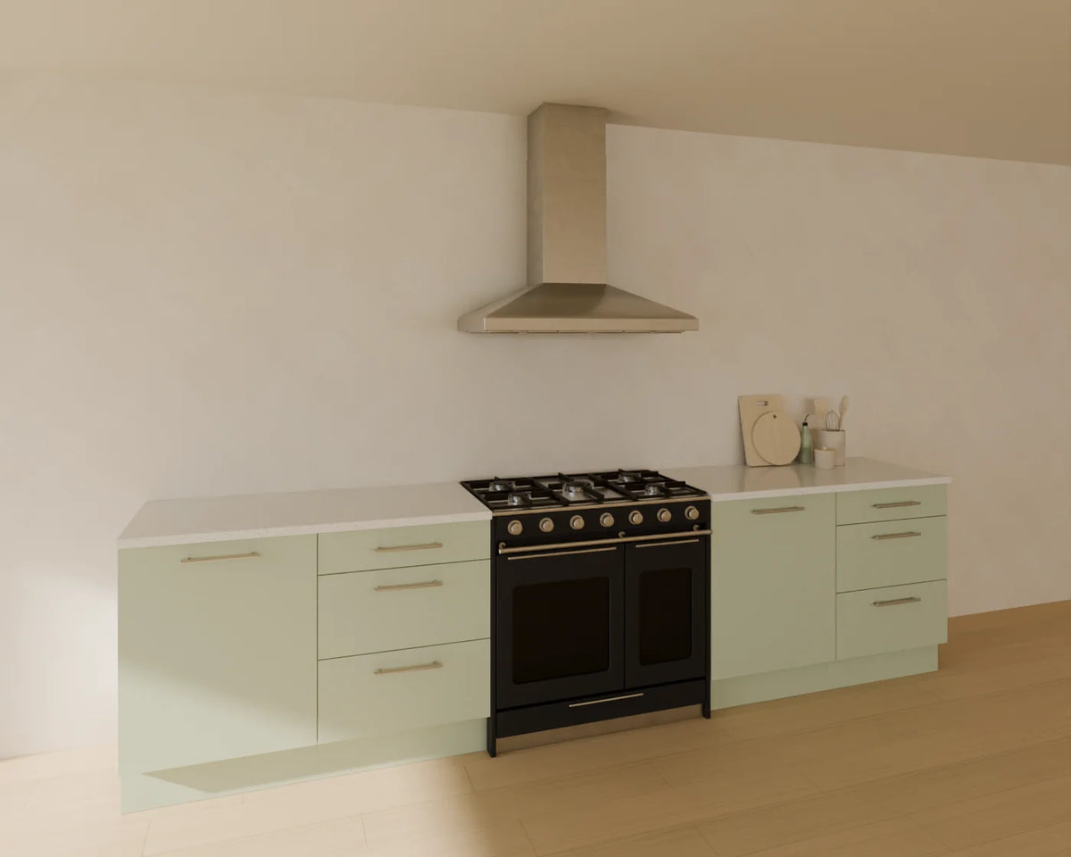 Range Cooker styled in a Linden House room with the base drawer cabinet, base door cabinet, worktop run, chimney range hood and kitchen counter accessories (sold separately)