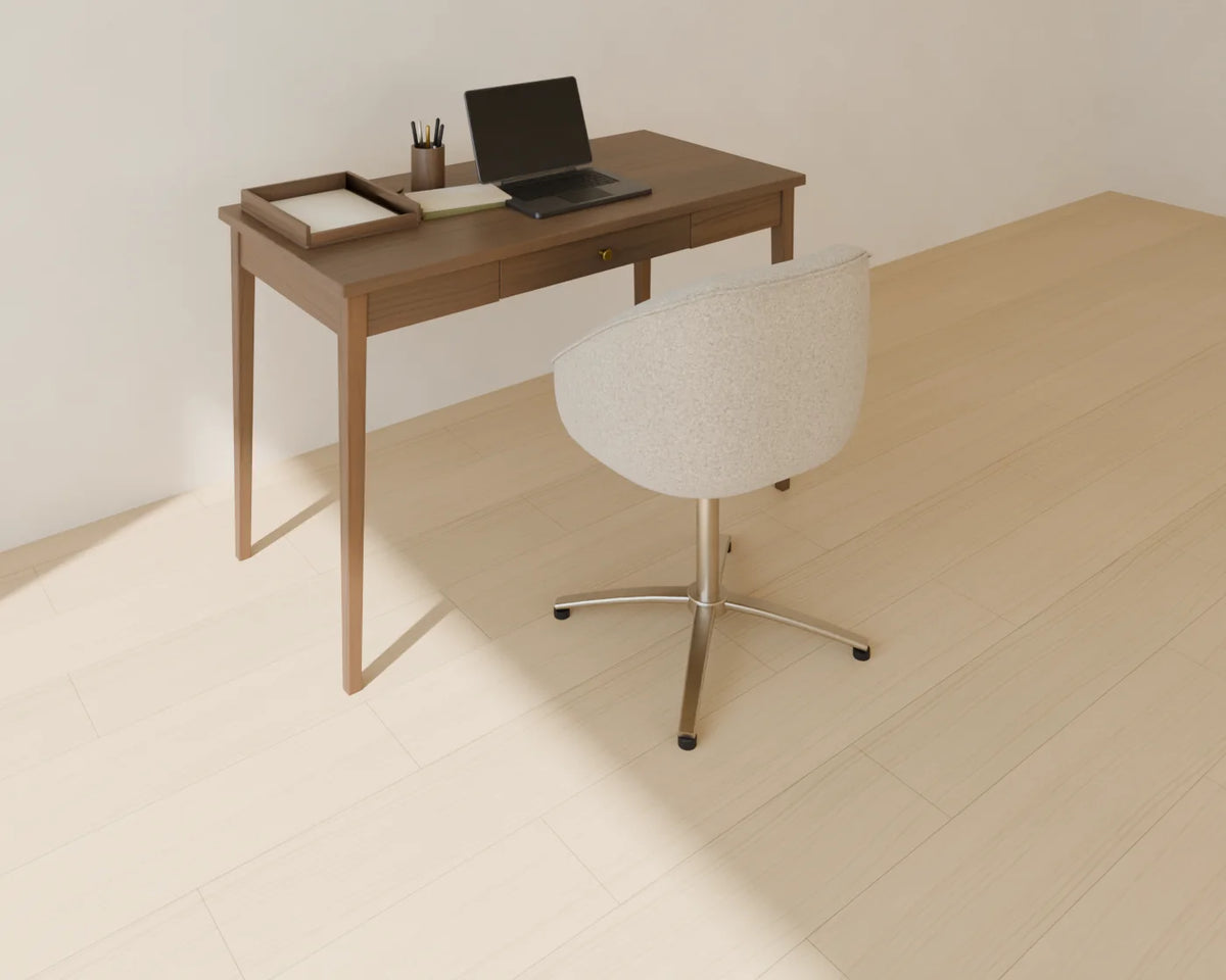 Writing Desk styled in a Linden House room with the upholstered desk chair, open laptop and desk accessories set (sold separately)