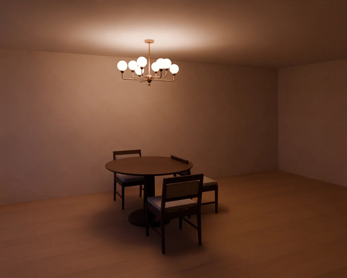 Branch Chandelier styled in a Linden House room with the round pedestal dining table and upholstered dining chair (sold separately)