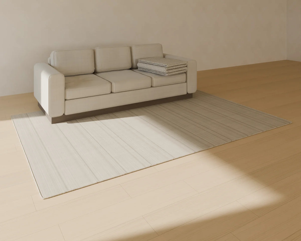 Chunky Knit Throw styled in a Linden House room with the three-seat sofa and flatweave wool rug (sold separately)