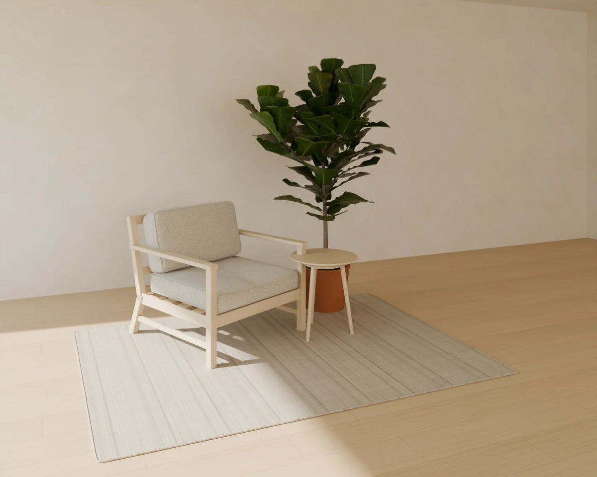 Fiddle-Leaf Fig in Planter styled in a Linden House room with the lounge armchair, round side table and flatweave wool rug (sold separately)