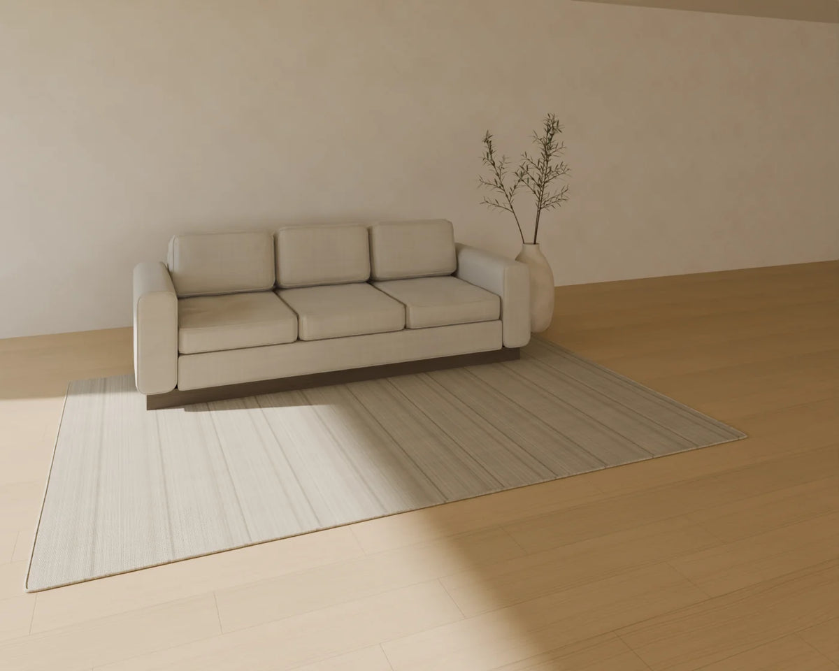 Floor Vase with Branches styled in a Linden House room with the three-seat sofa and flatweave wool rug (sold separately)