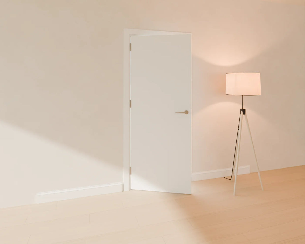 Flush Interior Door styled in a Linden House room with the skirting board and tripod floor lamp (sold separately)