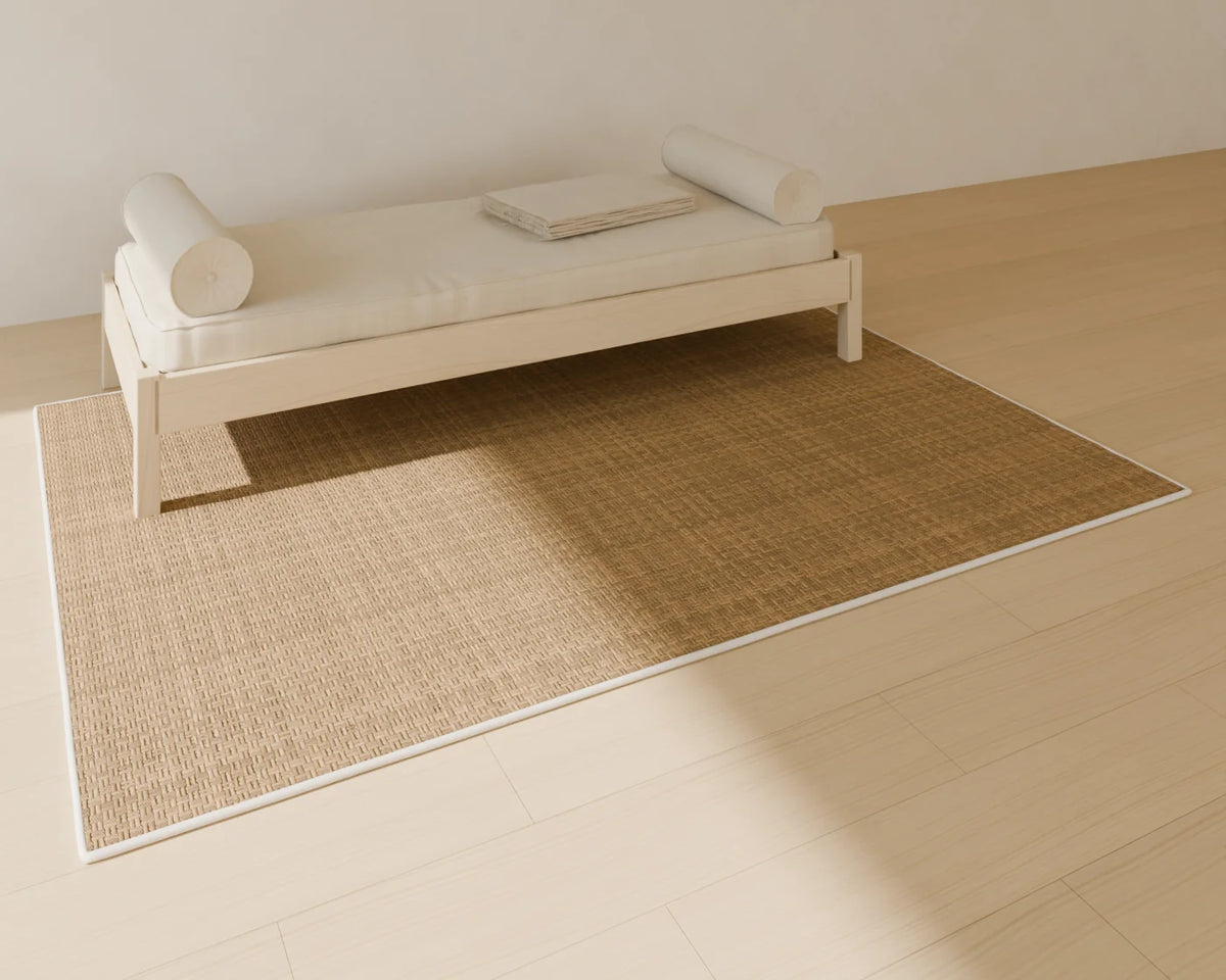 Folded Linen Throw styled in a Linden House room with the upholstered daybed and jute rug (sold separately)