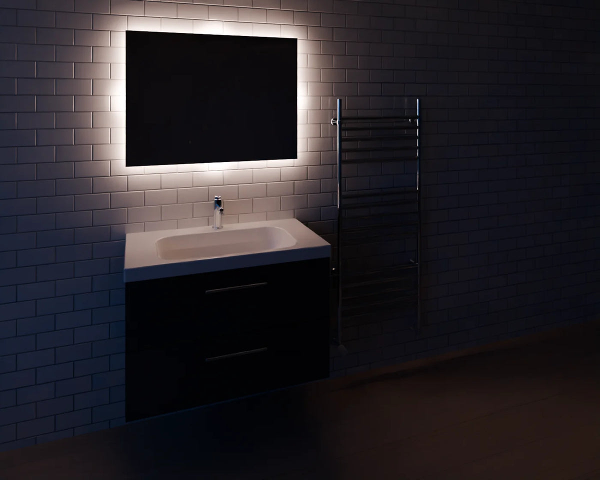 Illuminated Bathroom Mirror styled in a Linden House room with the wall-hung vanity unit, basin mixer tap and heated towel rail (sold separately)