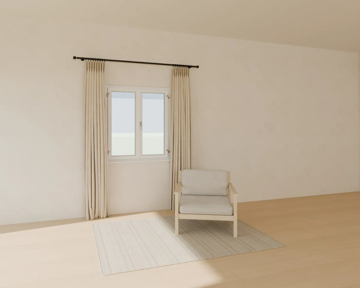 Linen Curtain Pair styled in a Linden House room with the casement window, lounge armchair and flatweave wool rug (sold separately)