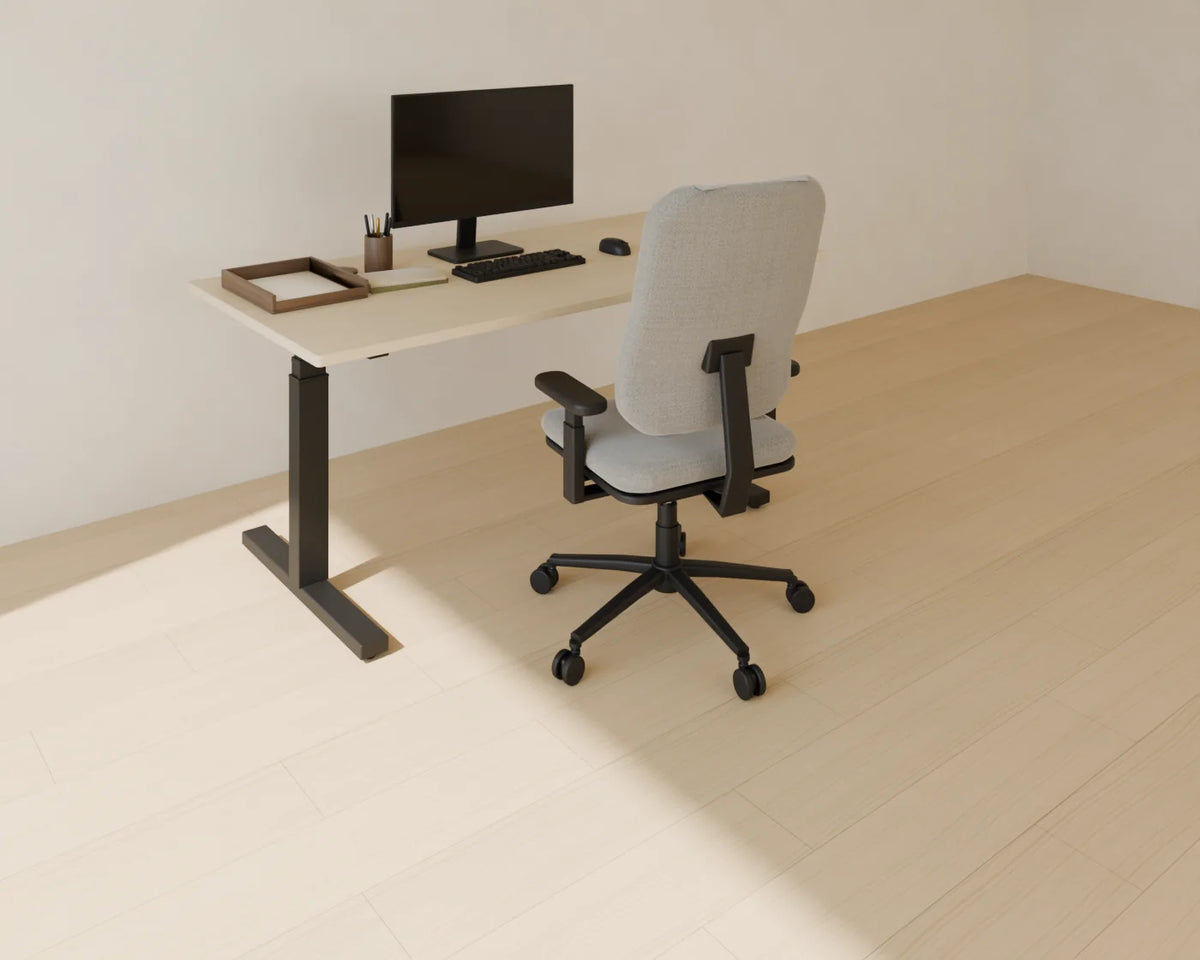 Monitor and Keyboard styled in a Linden House room with the sit-stand desk, ergonomic office chair and desk accessories set (sold separately)
