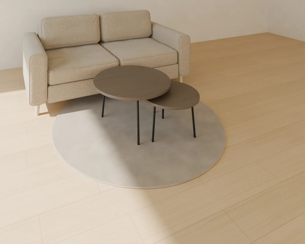 Nesting Coffee Tables styled in a Linden House room with the two-seat sofa and round rug (sold separately)
