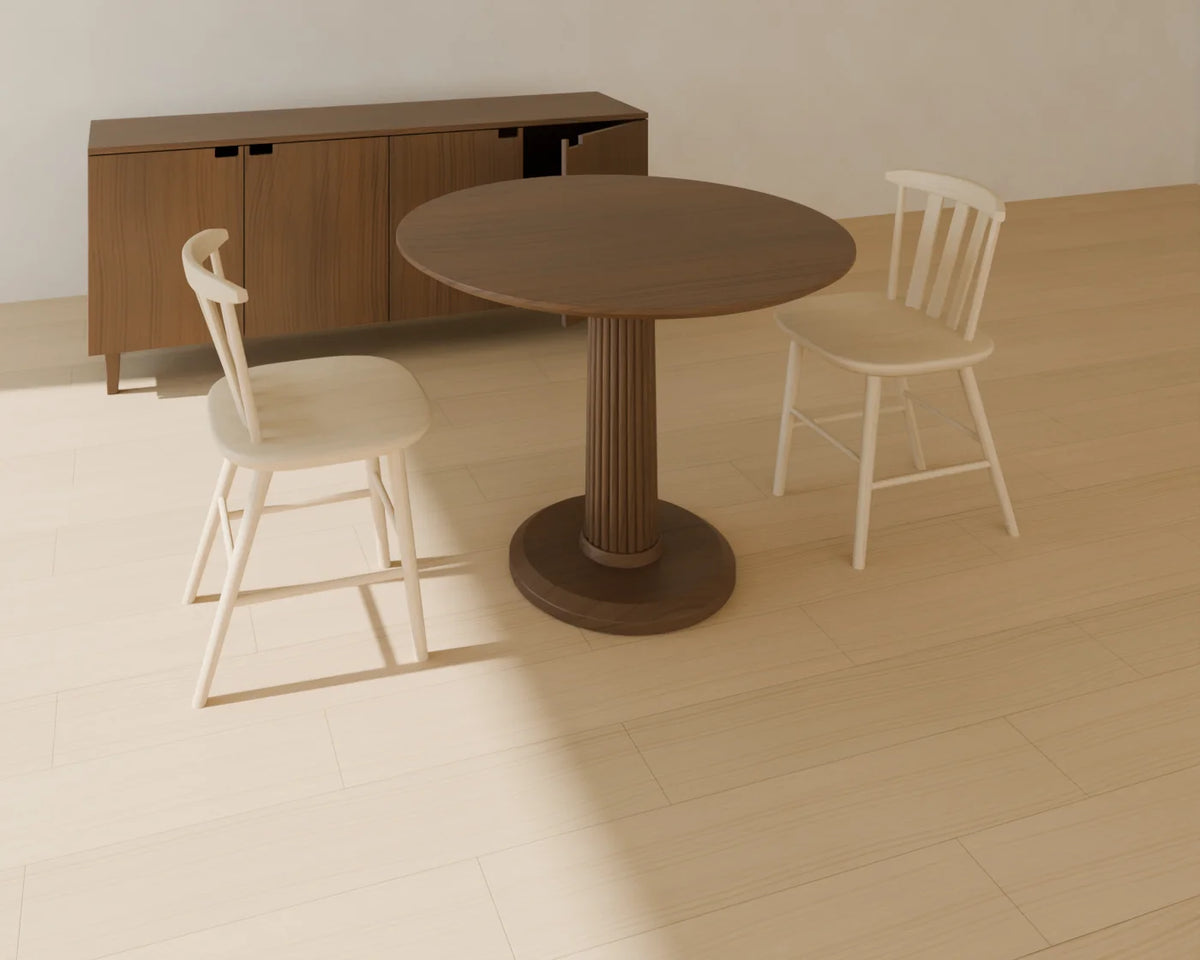 Sideboard styled in a Linden House room with the round pedestal dining table and wood dining chair (sold separately)