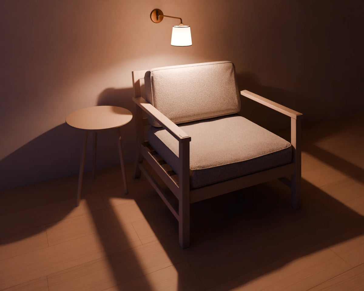 Swing-Arm Wall Sconce styled in a Linden House room with the lounge armchair and round side table (sold separately)