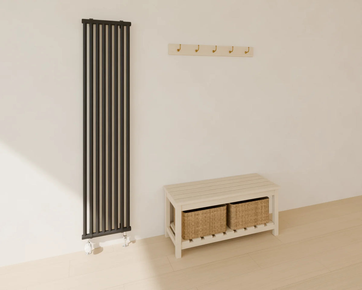 Vertical Tube Radiator styled in a Linden House room with the hallway storage bench and wall coat hooks (sold separately)