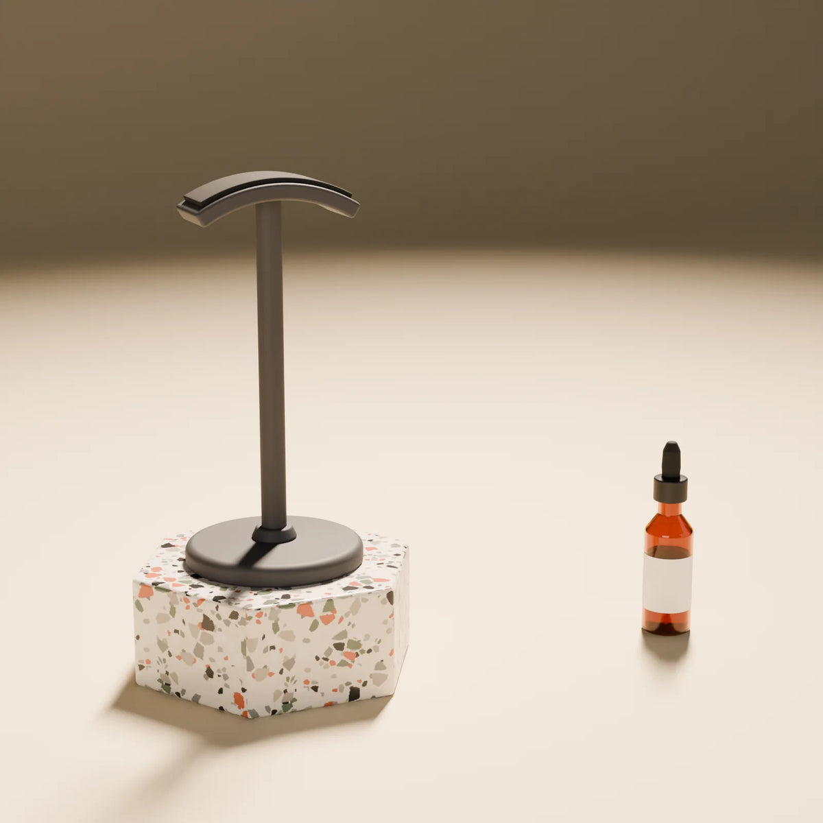 Headphone Stand styled in a Still Studio set with the hex podium and dropper bottle (sold separately)