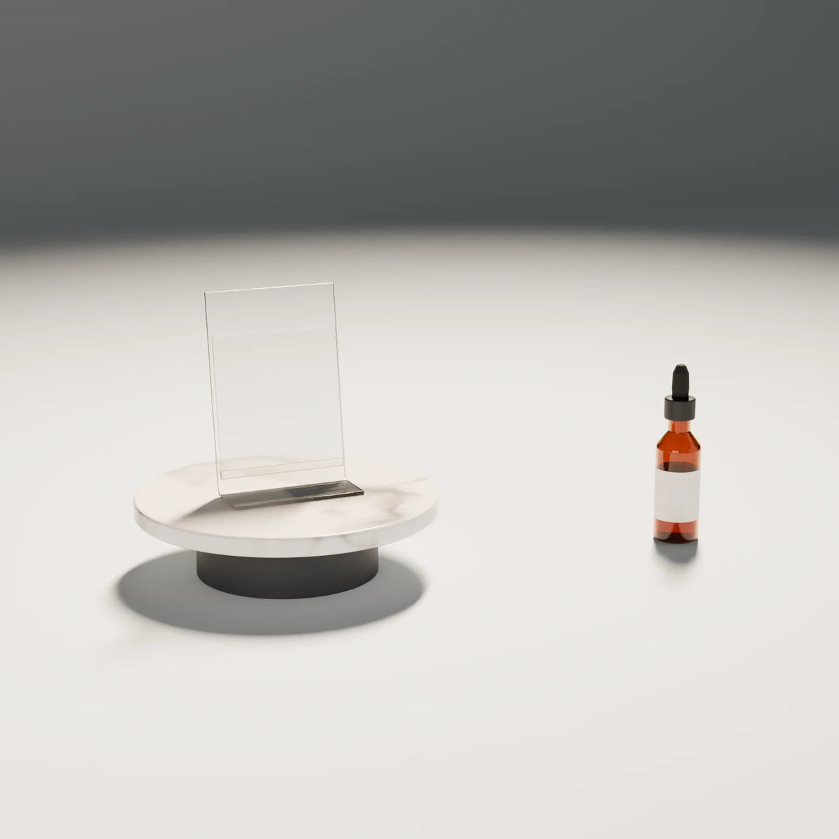 Acrylic Sign Holder styled in a Still Studio set with the floating disc podium and dropper bottle (sold separately)